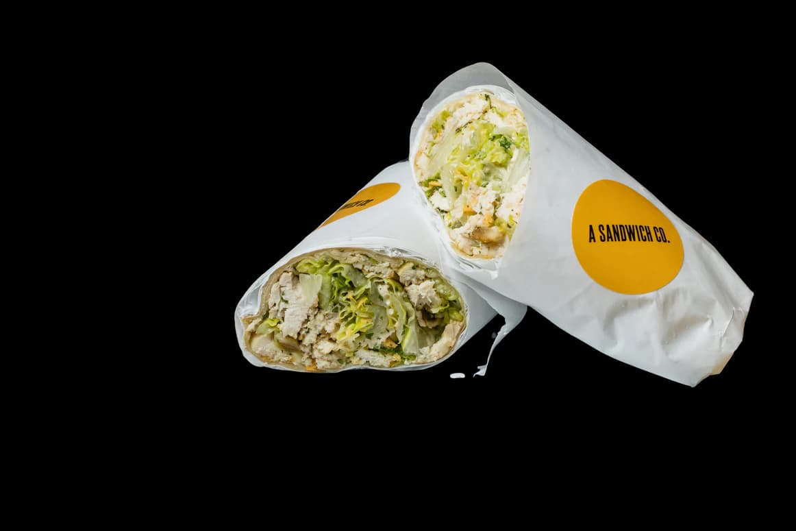 Chicken Caesar wrap with lettuce and fresh Parmesan