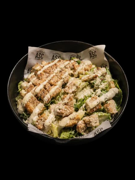 Chicken Caesar salad with little gem lettuce and Parmesan