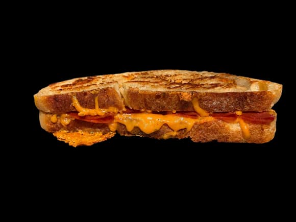 Golden grilled cheese sandwich on sourdough bread